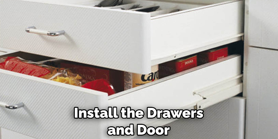 Install the Drawers and Door