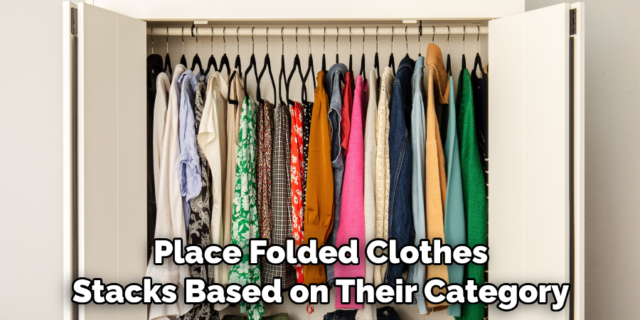 Place Folded Clothes in Stacks Based on Their Category