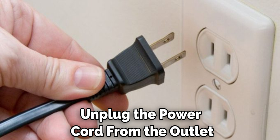 Unplug the Power Cord From the Outlet