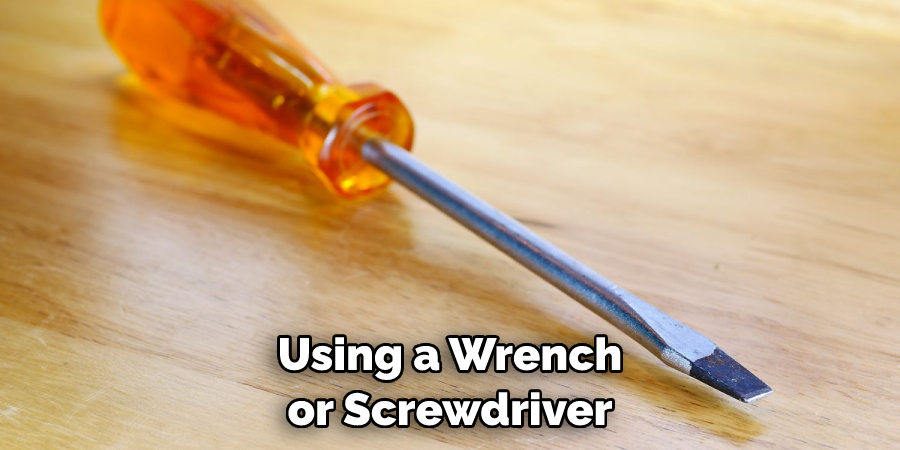 Using a Wrench or Screwdriver