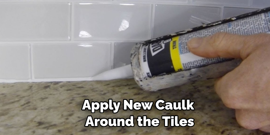 Apply New Caulk Around the Tiles