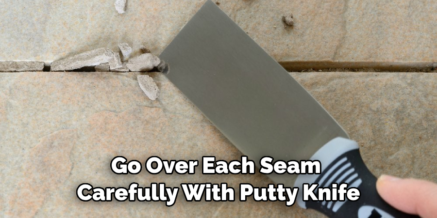 Go Over Each Seam Carefully With a Putty Knife