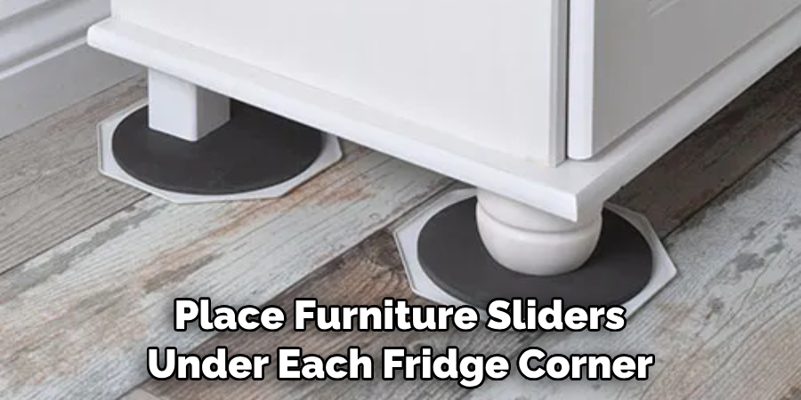 Place Furniture Sliders Under Each Fridge Corner 