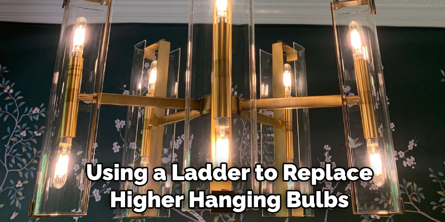 Using a Ladder to Replace Higher Hanging Bulbs