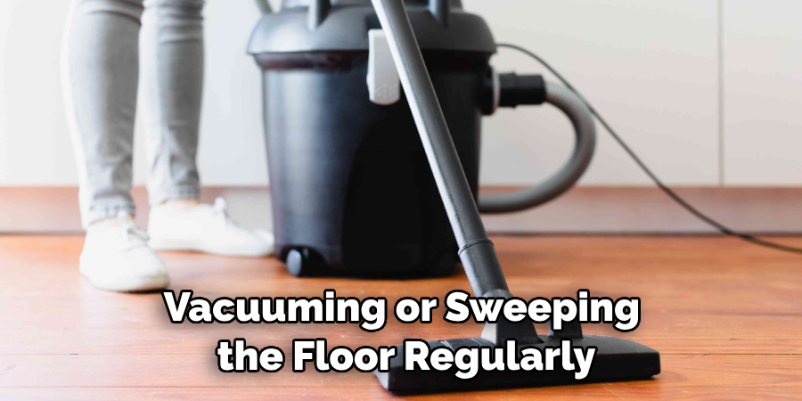 Vacuuming or Sweeping the Floor Regularly
