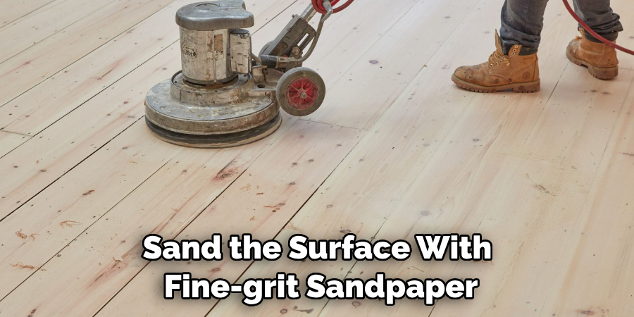 Sand the Surface With Fine-grit Sandpaper