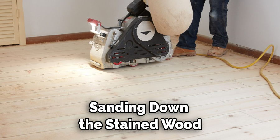 Sanding Down the Stained Wood