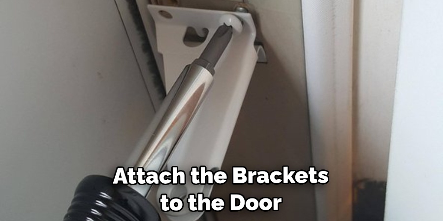 Attach the Brackets to the Door