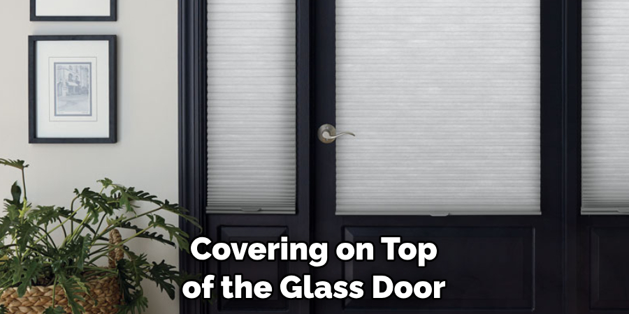 Covering on Top of the Glass Door