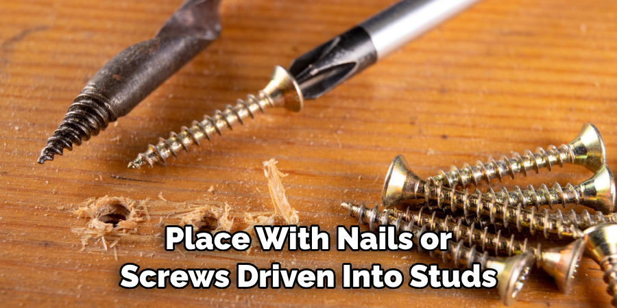 Place With Nails or Screws Driven Into Studs