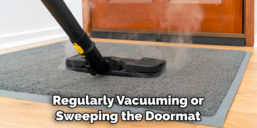 Regularly Vacuuming or Sweeping the Doormat