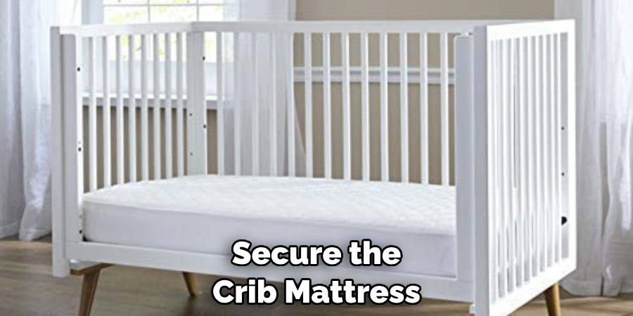 Secure the Crib Mattress