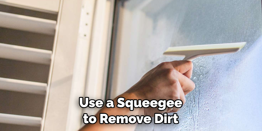 Use a Squeegee to Remove Dirt