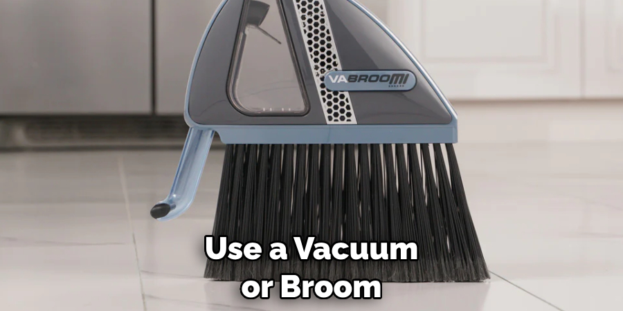 Use a Vacuum or Broom