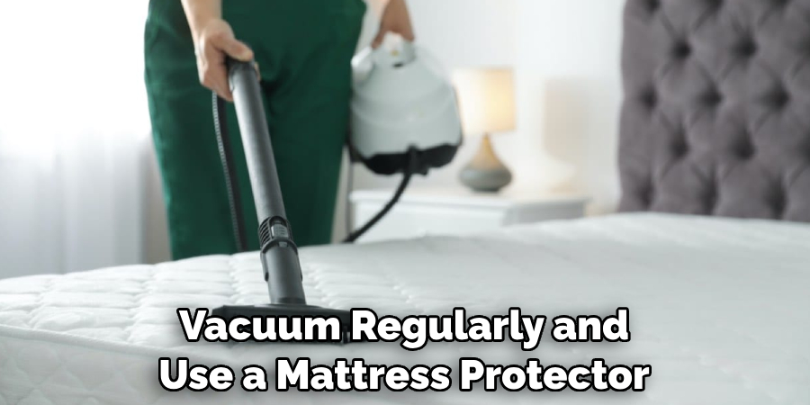 Vacuum Regularly and Use a Mattress Protector