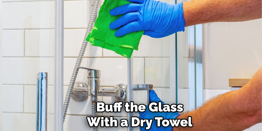 Buff the Glass With a Dry Towel