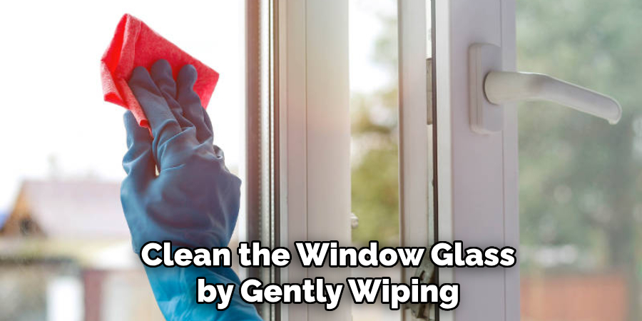Clean the Window Glass by Gently Wiping