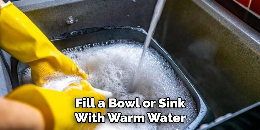 Fill a Bowl or Sink With Warm Water