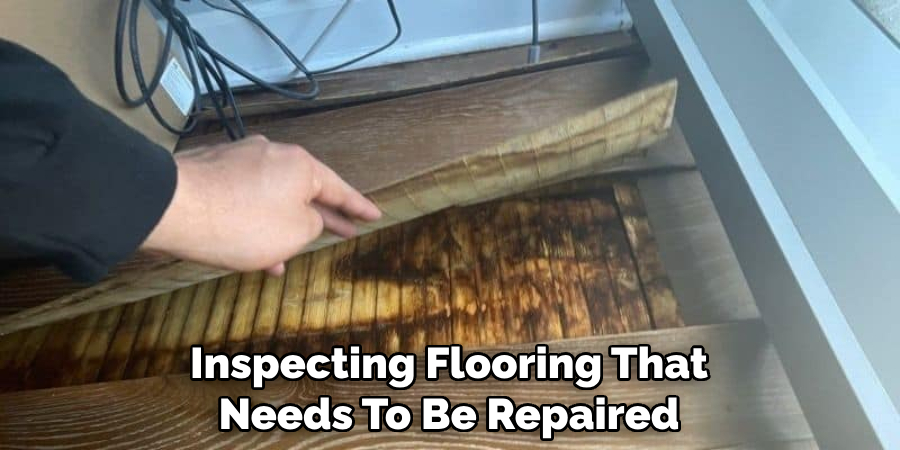 Inspecting Flooring That Needs To Be Repaired