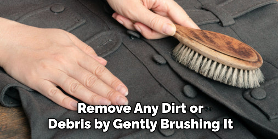  Remove Any Dirt or Debris by Gently Brushing It