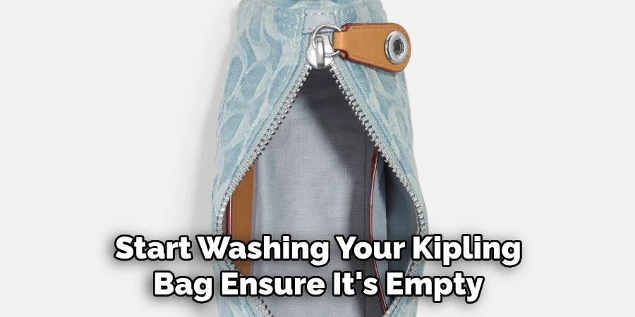 Start Washing Your Kipling Bag Ensure It's Empty