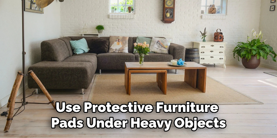 Use Protective Furniture Pads Under Heavy Objects