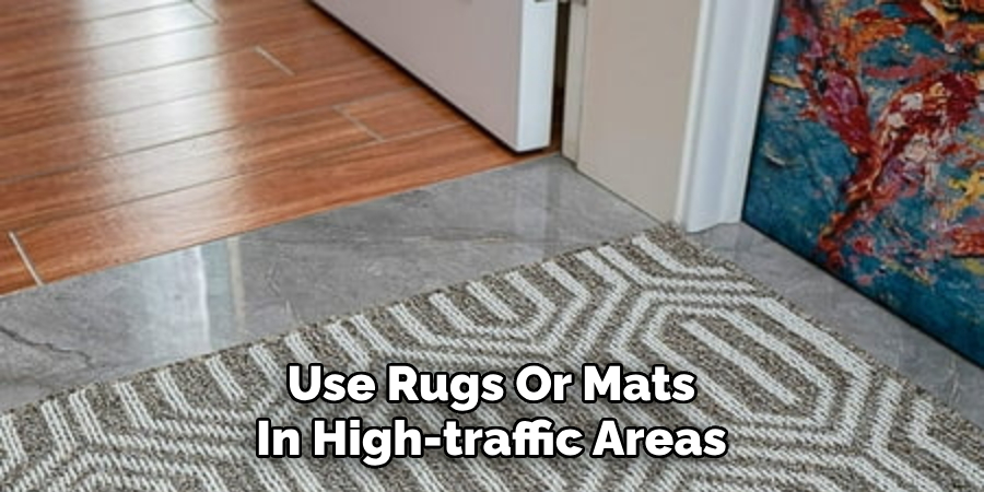 Use Rugs Or Mats In High-traffic Areas