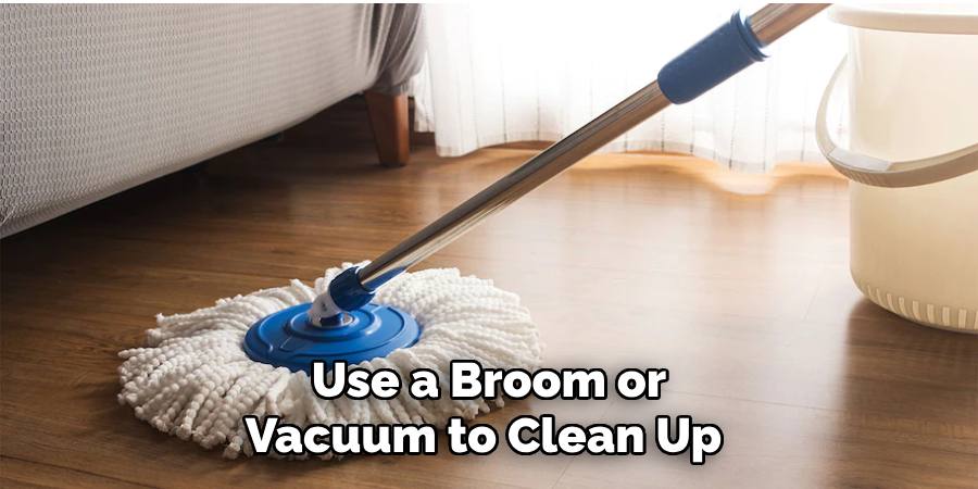 Use a Broom or Vacuum to Clean Up 