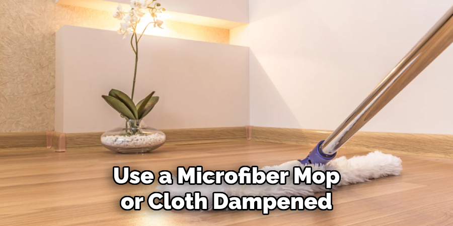 Use a Microfiber Mop or Cloth Dampened