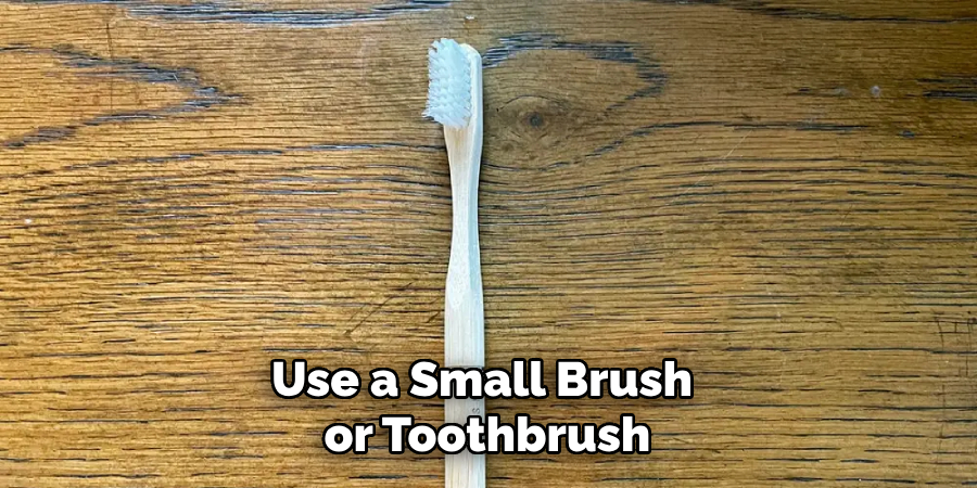 Use a Small Brush or Toothbrush