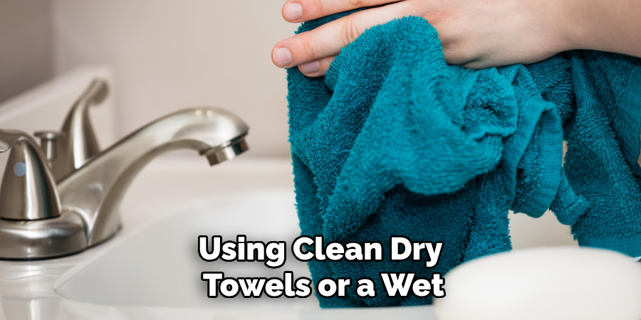 Using Clean Dry Towels or a Wet