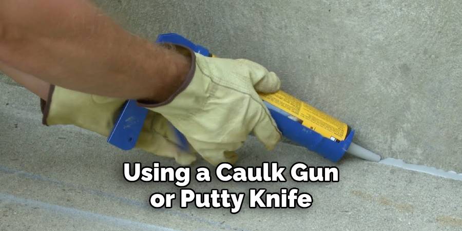 Using a Caulk Gun or Putty Knife