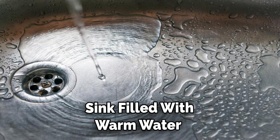  Sink Filled With Warm Water 