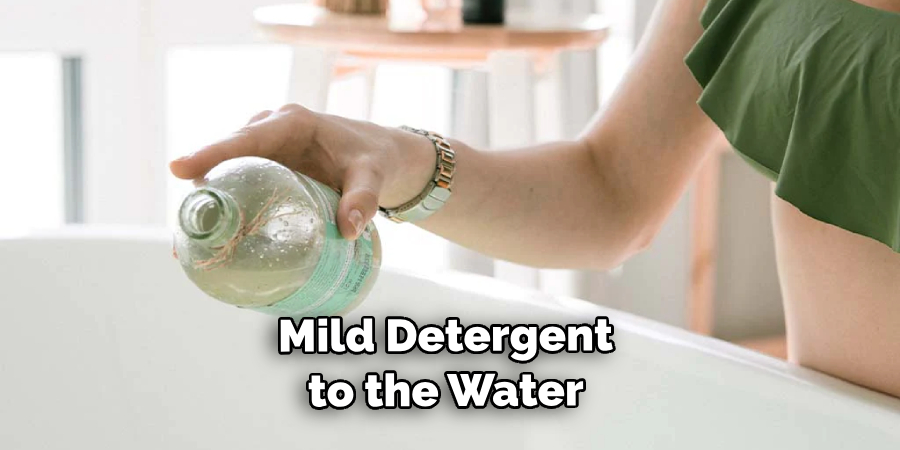 Small Amount of Mild Detergent to the Water
