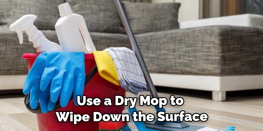 Use a Dry Mop to Wipe Down the Surface