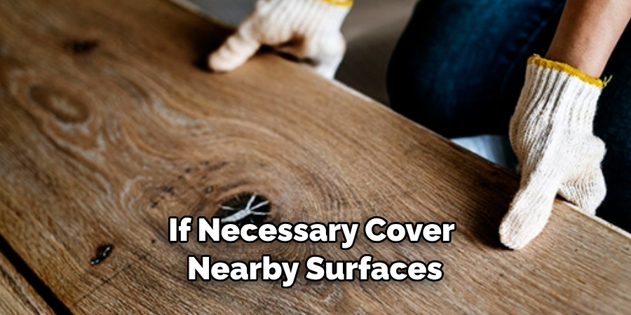 If Necessary Cover Nearby Surfaces