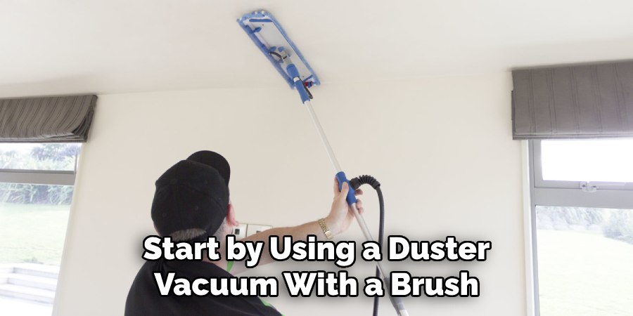 Start by Using a Duster Vacuum With a Brush