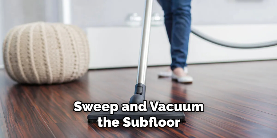 Sweep and Vacuum the Subfloor