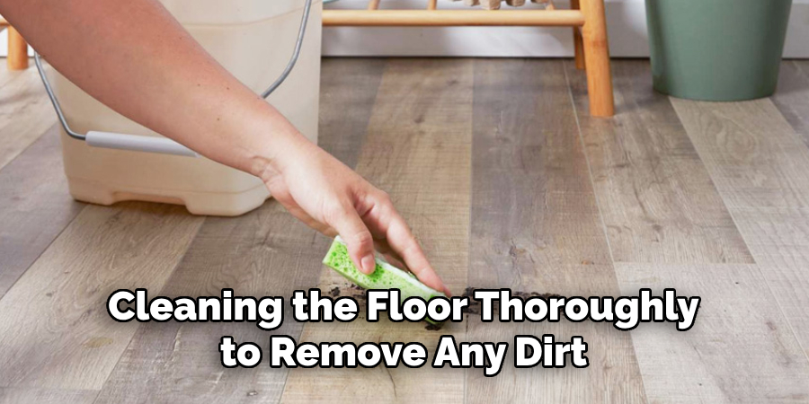Cleaning the Floor Thoroughly to Remove Any Dirt