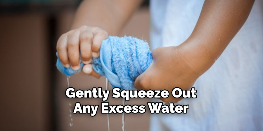 Gently Squeeze Out Any Excess Water