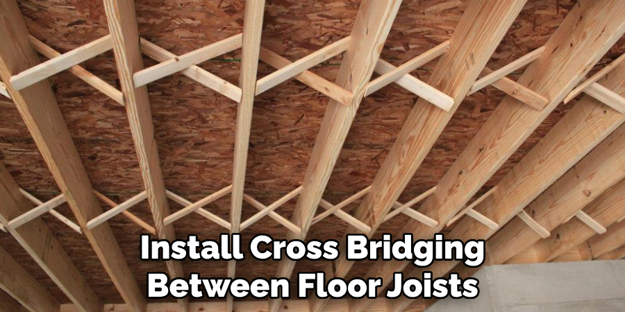 Install Cross Bridging Between Floor Joists