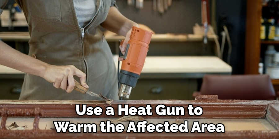 Use a Heat Gun to Warm the Affected Area