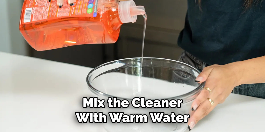 Mix the Cleaner With Warm Water