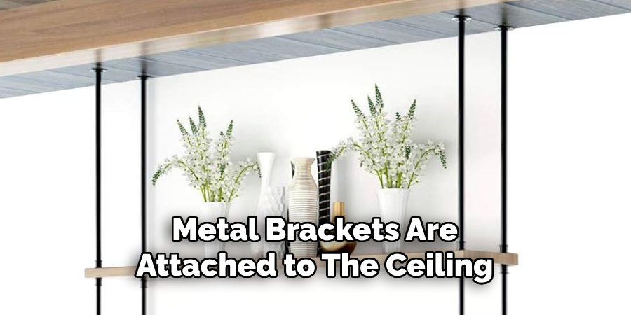  Metal Brackets Are Attached to the Ceiling