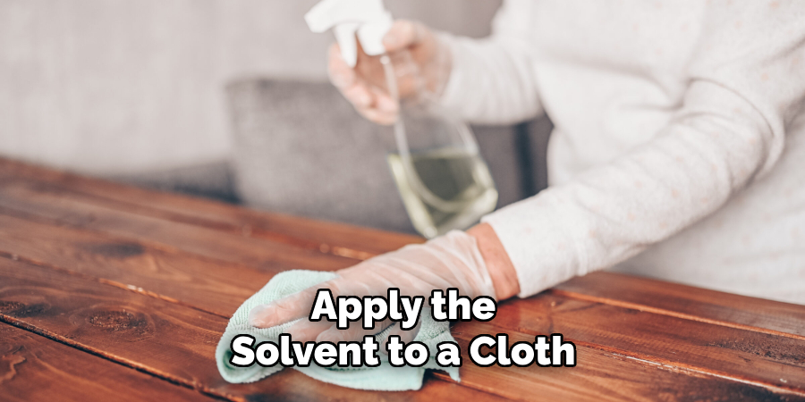 Apply the Solvent to a Cloth