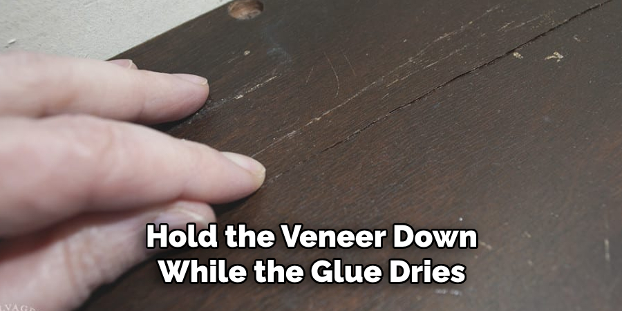 Hold the Veneer Down While the Glue Dries