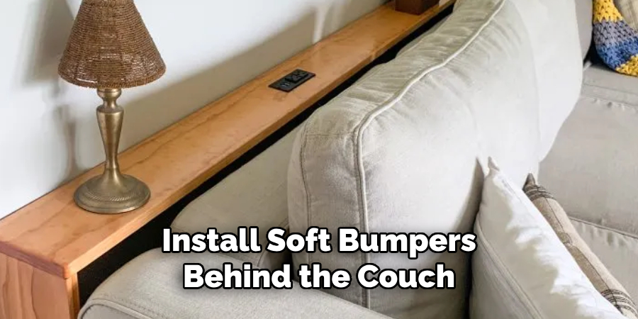 Install Soft Bumpers Behind the Couch