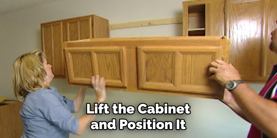 Lift the Cabinet and Position It