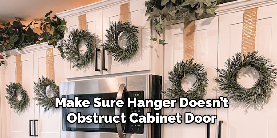 Make Sure Hanger Doesn’t Obstruct Cabinet Door