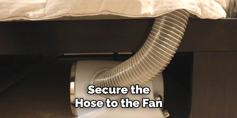 Secure the Hose to the Fan